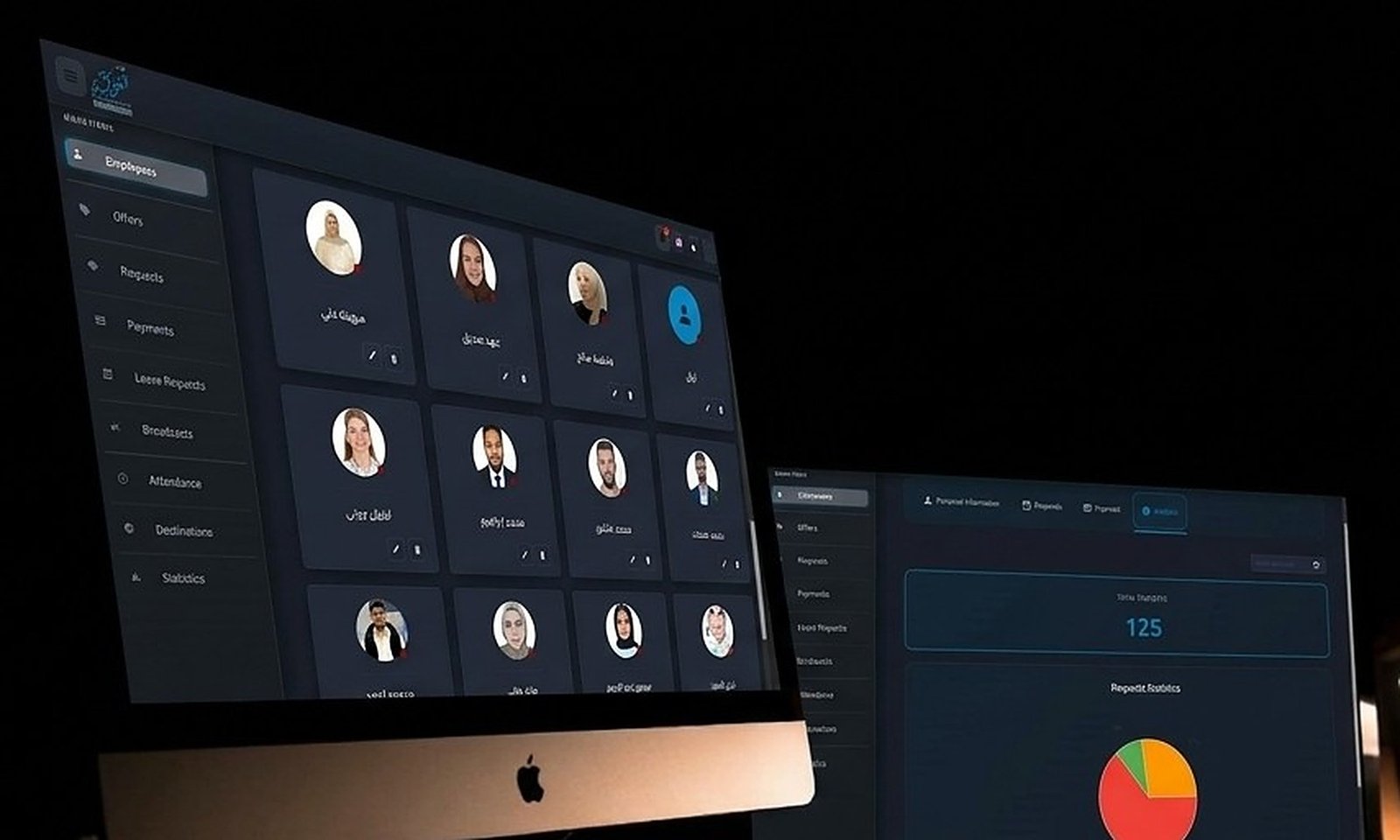 Al-Fakhamah Tourism internal management dashboard on desktop monitors